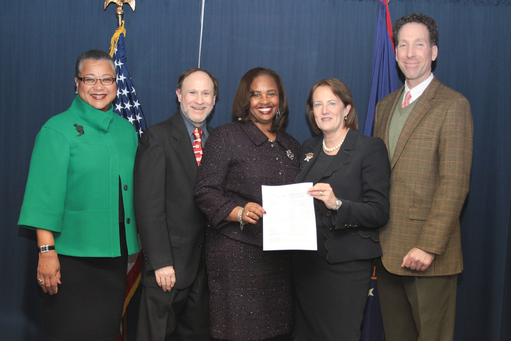 The Chief Negotiator, Deputy Administrator Johns and Administrator Mills Contract Signing