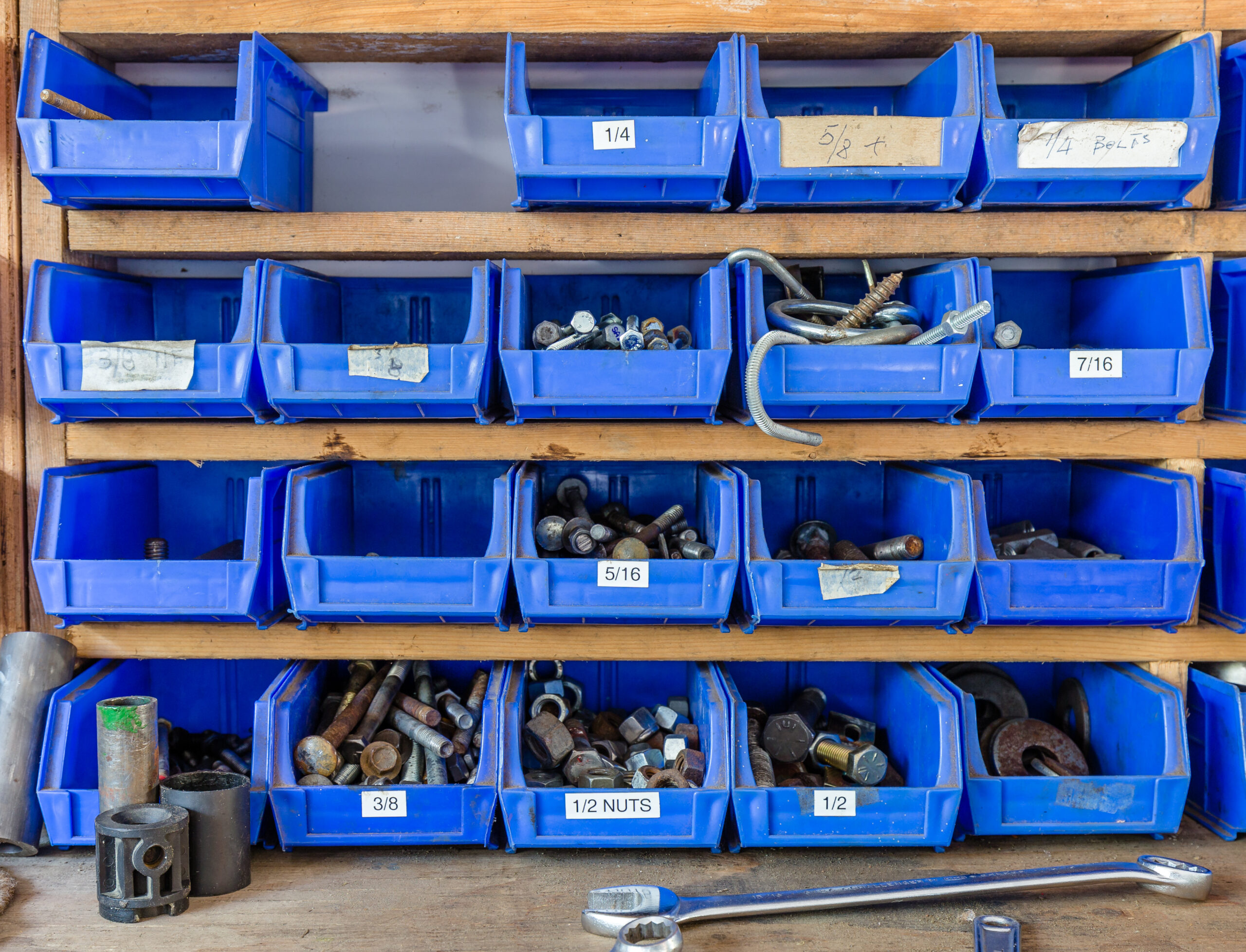 Blue plastic storage organizer boxes for screws